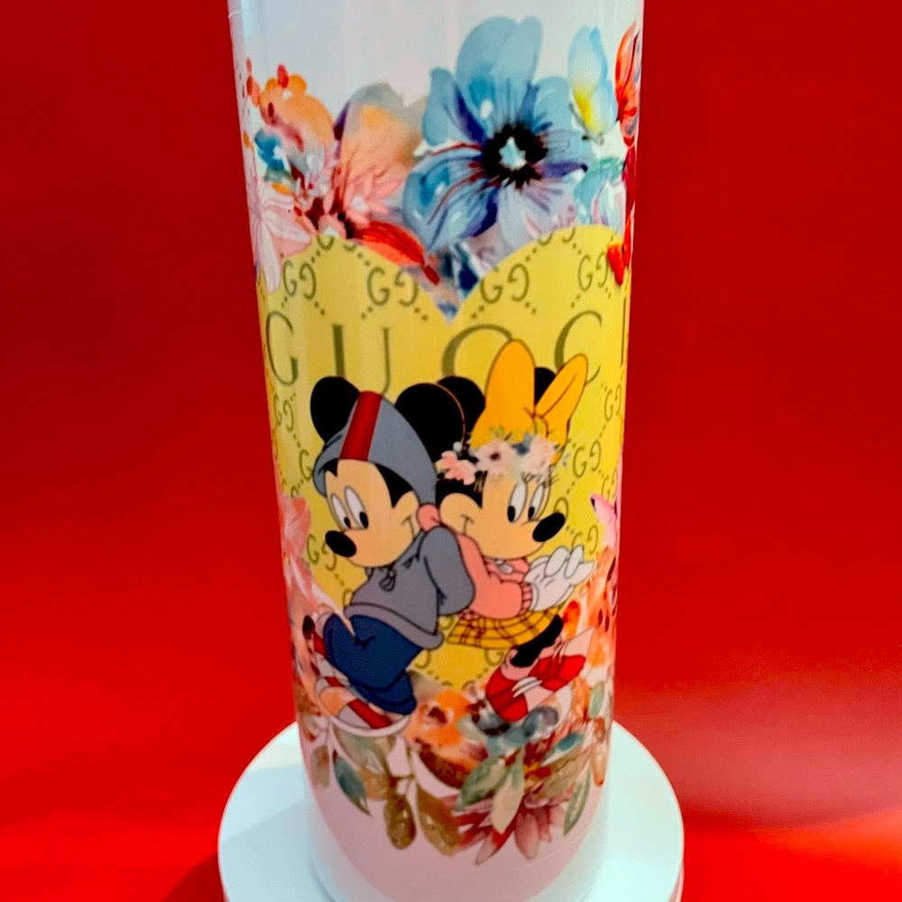 Mickey and Minnie Mouse with a little Gucci 20 ounce sublimation tumbler